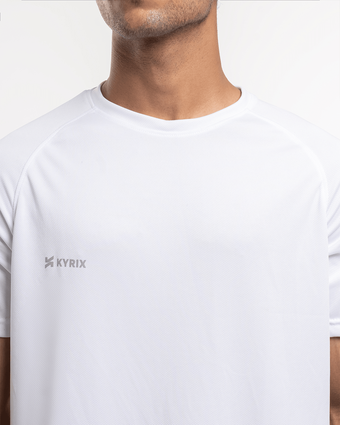 Core performance raglan T-shirt for men in white by KYRIX