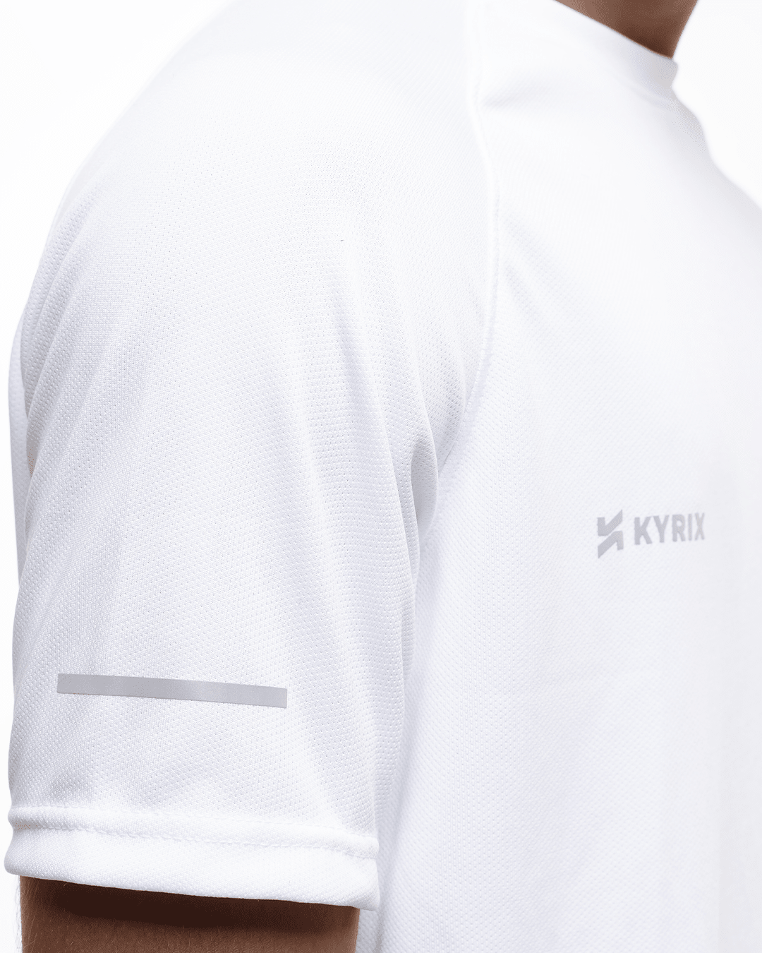 Close-up of core performance raglan T-shirt for men in white by KYRIX